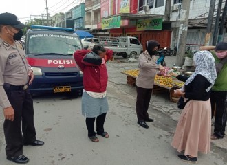Rutin Berikan Himbauan, Sat Binmas Polresta Pekanbaru Sambangi Pasar Tumpah