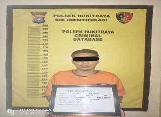 Seorang Pelaku Judi Togel Online Ditangkap Polsek Bukit Raya.