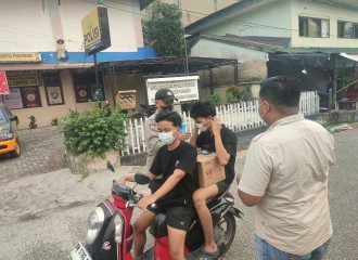 Lindungi Warga Dari Kabut Asap, Polsek Kawasan Pelabuhan Bagikan Masker Gratis